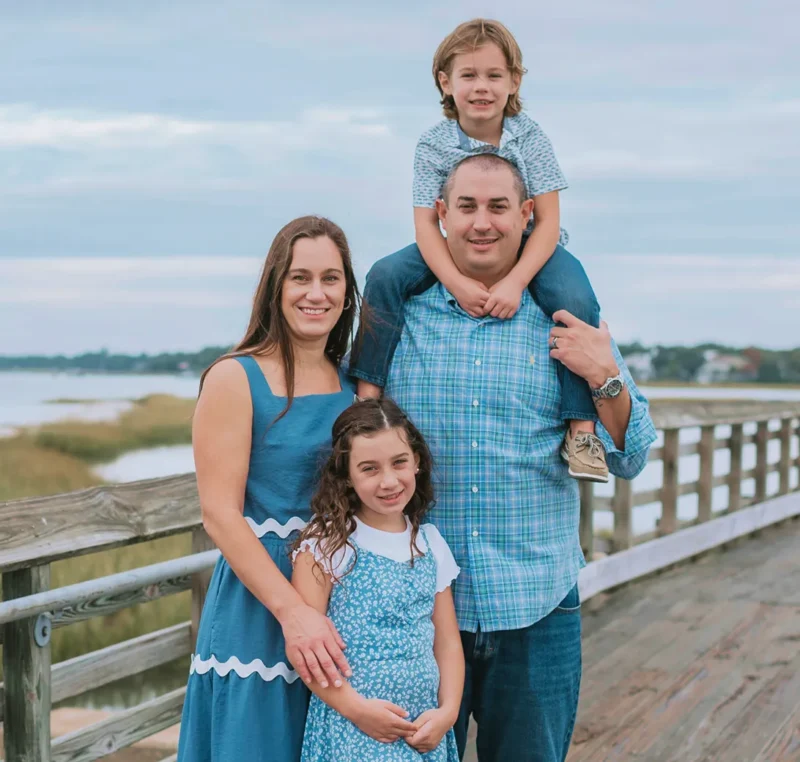 Legacy Pools owners Casey and Kelly Mims with their family.