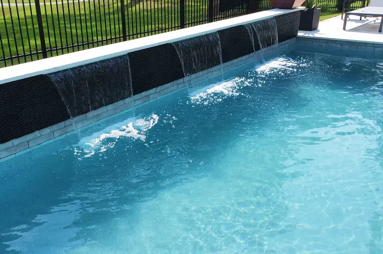 A picture of bubbling waterfalls in a pool