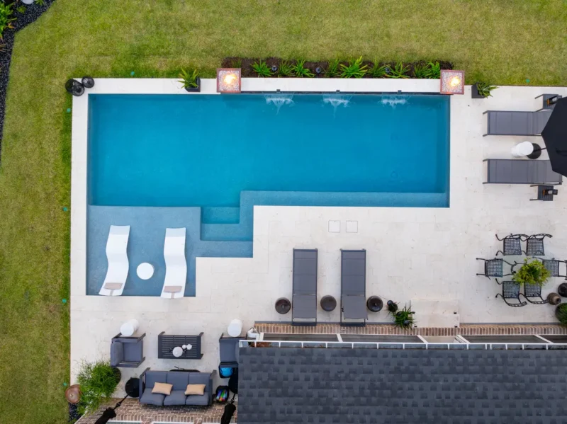 An aerial view of a remodeled pool