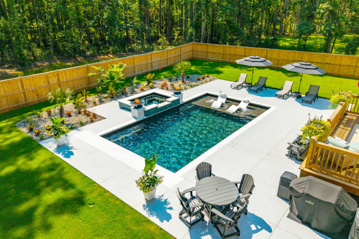 A Hogan gunite pool built in a backyard by a swimming pool builder in South Carolina